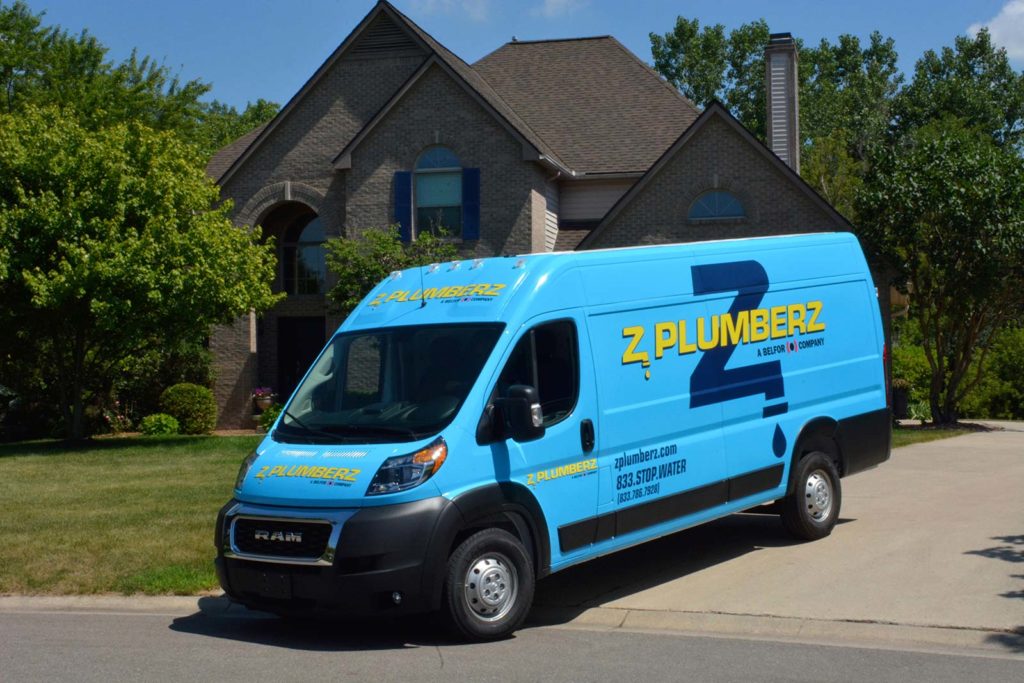 Z PLUMBERZ plumber franchise opportunity van in driveway of house / Investment in 2022