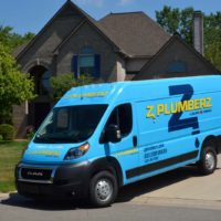 Z PLUMBERZ plumber franchise opportunity van in driveway of house